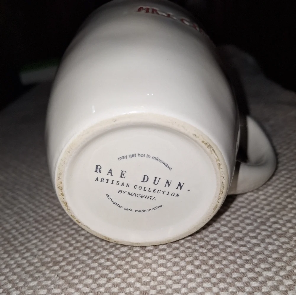 A Rae Dunn Mrs Claus coffee cup. It's pre-loved in great condition.